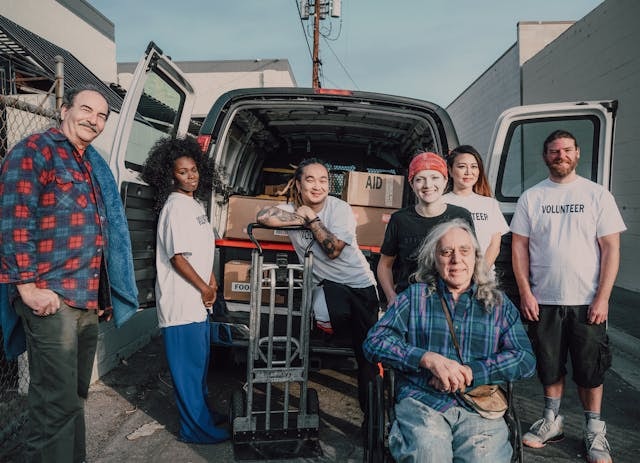 Group of people at the back of a car