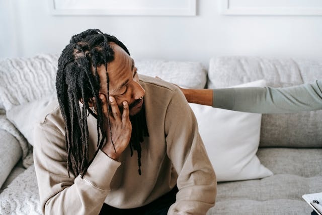 frustrated-black-man-talking-to-female-psychologist-or-friend