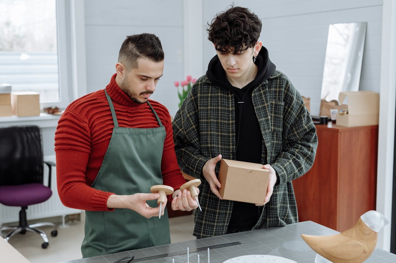 men-looking-at-a-product-and-it-s-packaging