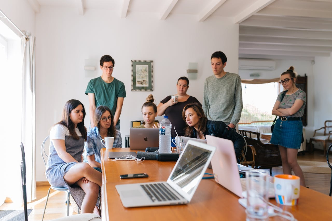 group-of-people-watching-on-laptop