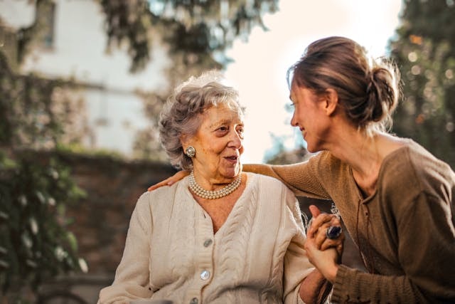 Woman-talking-to-a-aged-woman