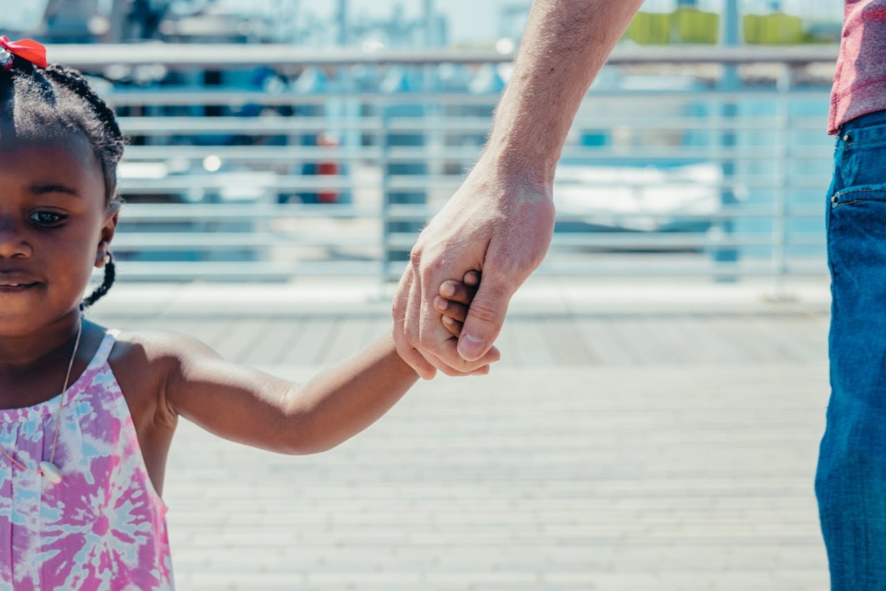 kid holding hands