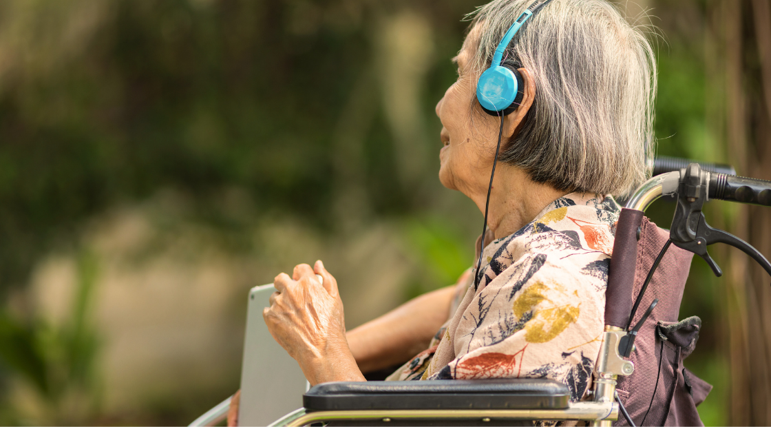 old woman listening to music
