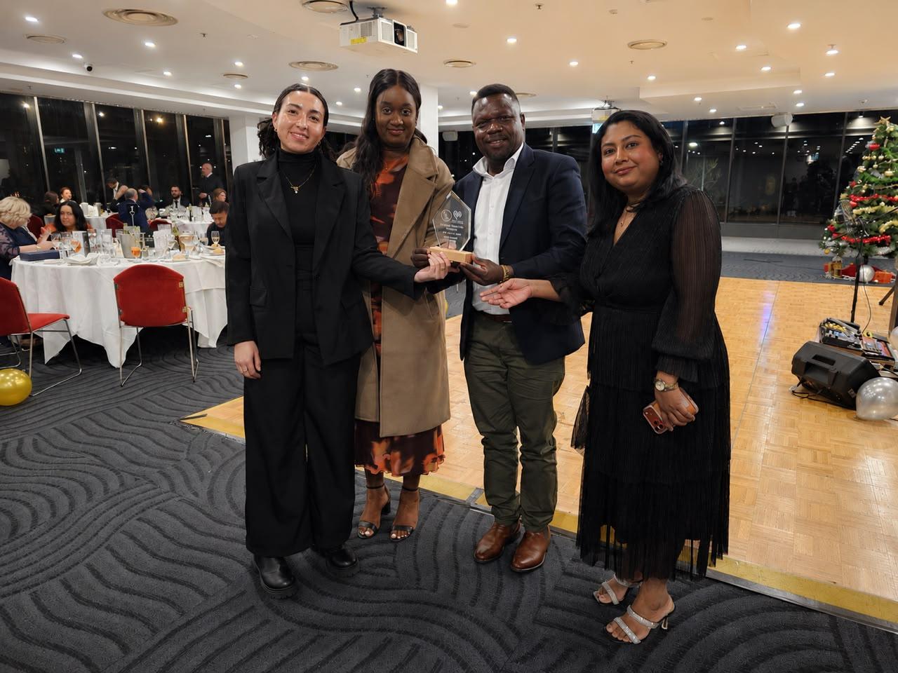 Re.Connect Support Services Team holding the best NDIS Service Provider Award