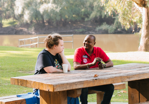 Our staff with a client in the park